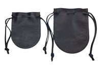 Handcrafted black leather drawstring pouches.  Showing the differences of sizes.  Made in the USA.  Perfect for dice, coins, jewelry, and everyday carry.