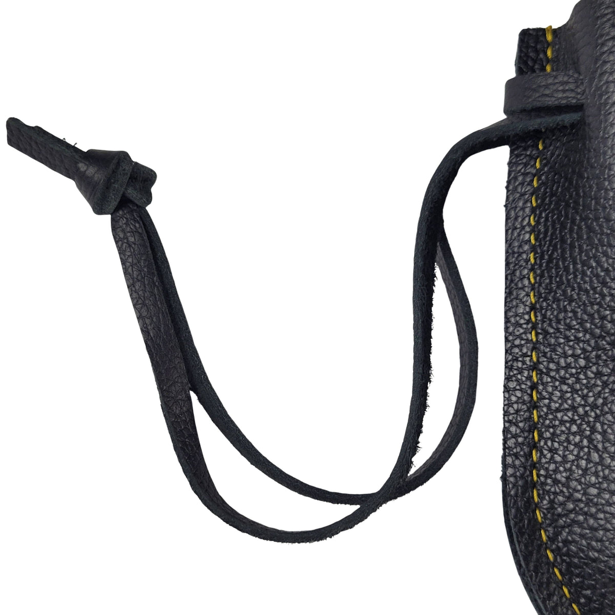 Handcrafted black leather drawstring pouch displayed showing the strap construction.  Ideal for travel gear, notebooks, electronics, and everyday carry accessories.