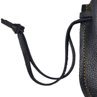 Handcrafted black leather drawstring pouch displayed showing the strap construction.  Ideal for travel gear, notebooks, electronics, and everyday carry accessories.